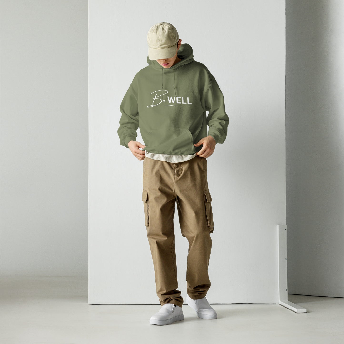 A Unisex BE WELL 1/2 Script Hoodie