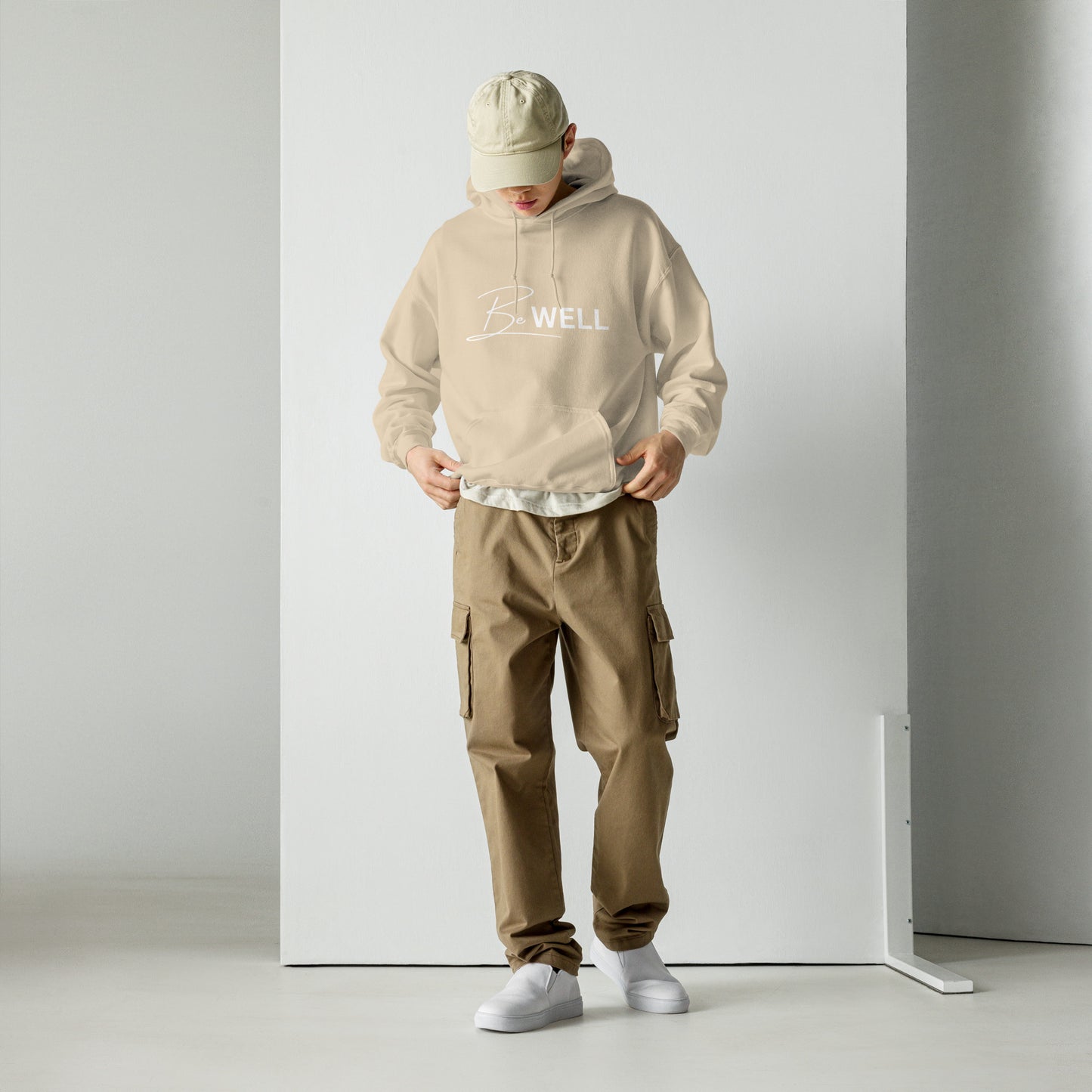 A Unisex BE WELL 1/2 Script Hoodie