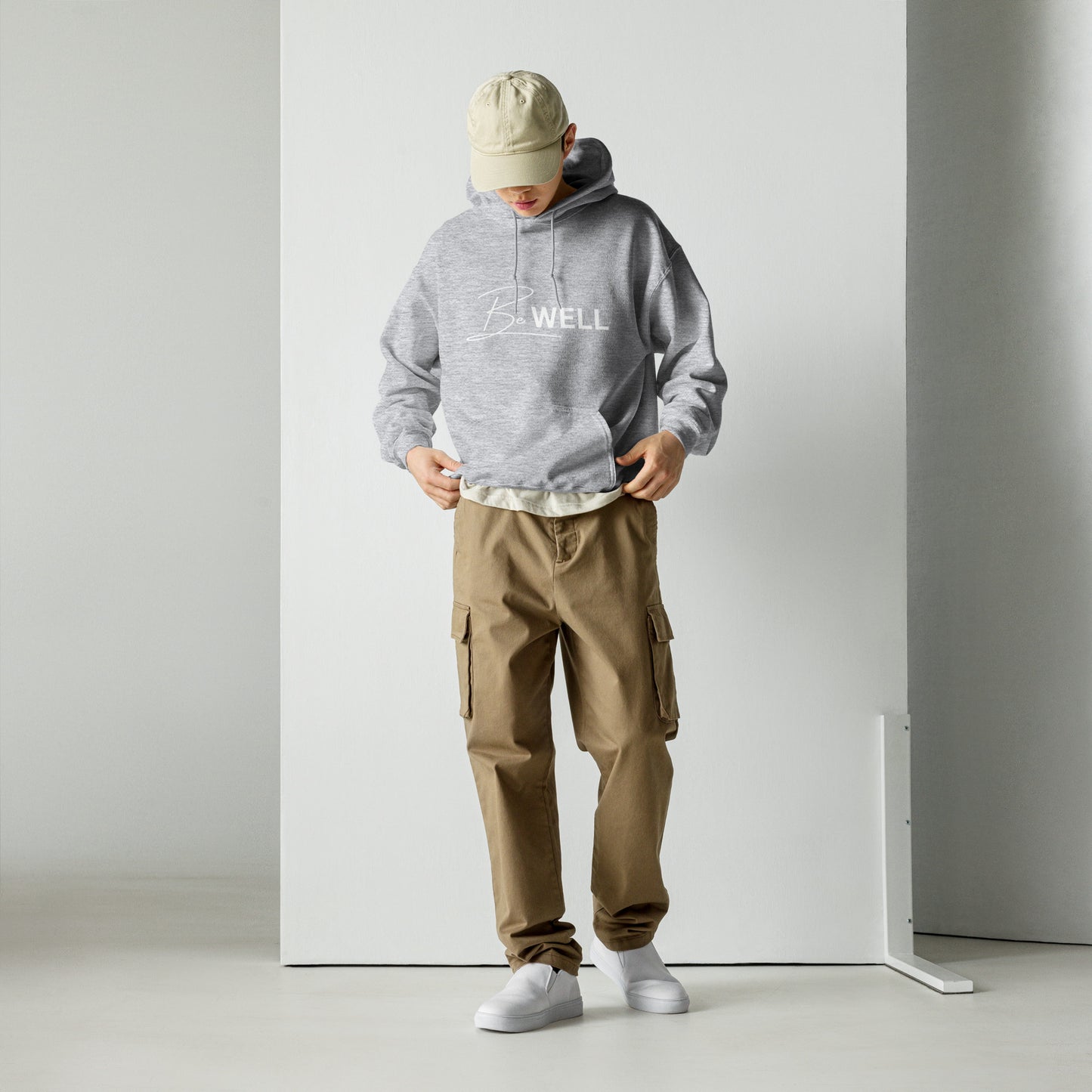 A Unisex BE WELL 1/2 Script Hoodie